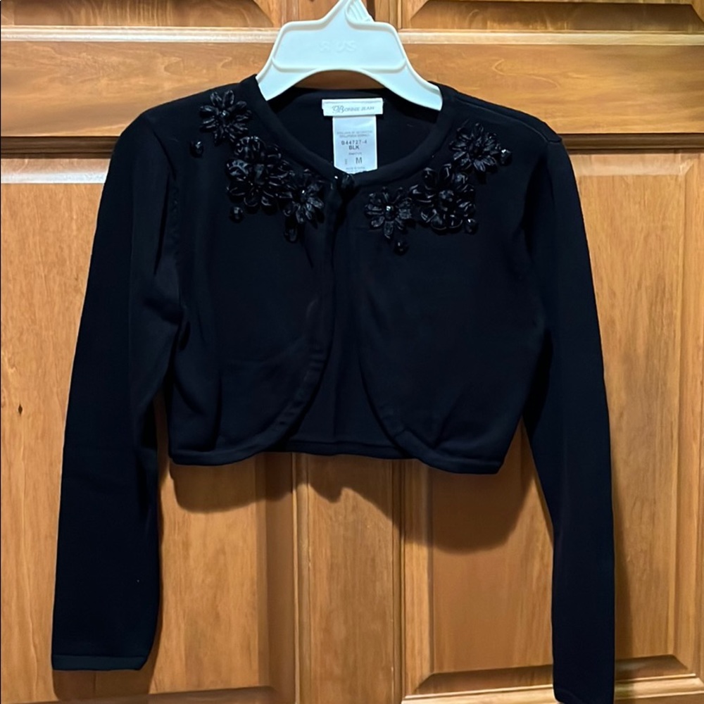Girl’s black shrug sweater